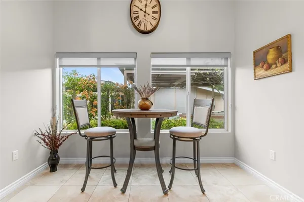 a room with furniture and a large window