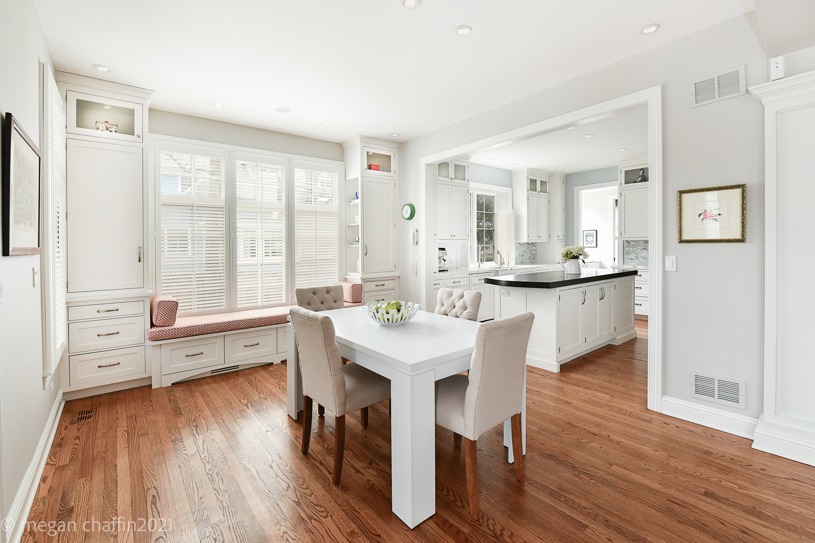 102 Church Road Winnetka, IL 60093 - Photo 11 of 46 a open dining room with wooden floor and furniture