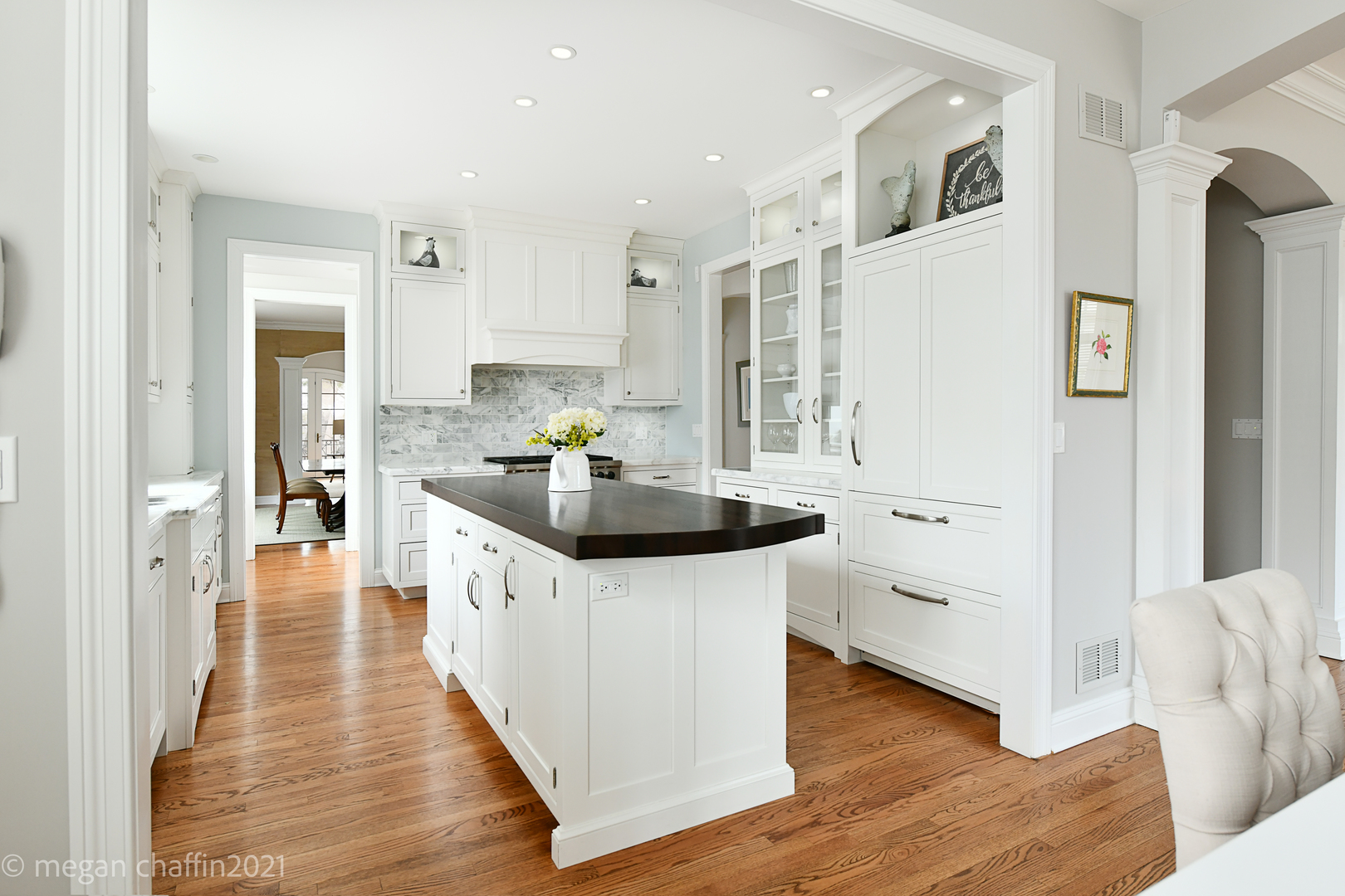 102 Church Road Winnetka, IL 60093 - Photo 12 of 46 a kitchen with stainless steel appliances a sink a stove a refrigerator and cabinets