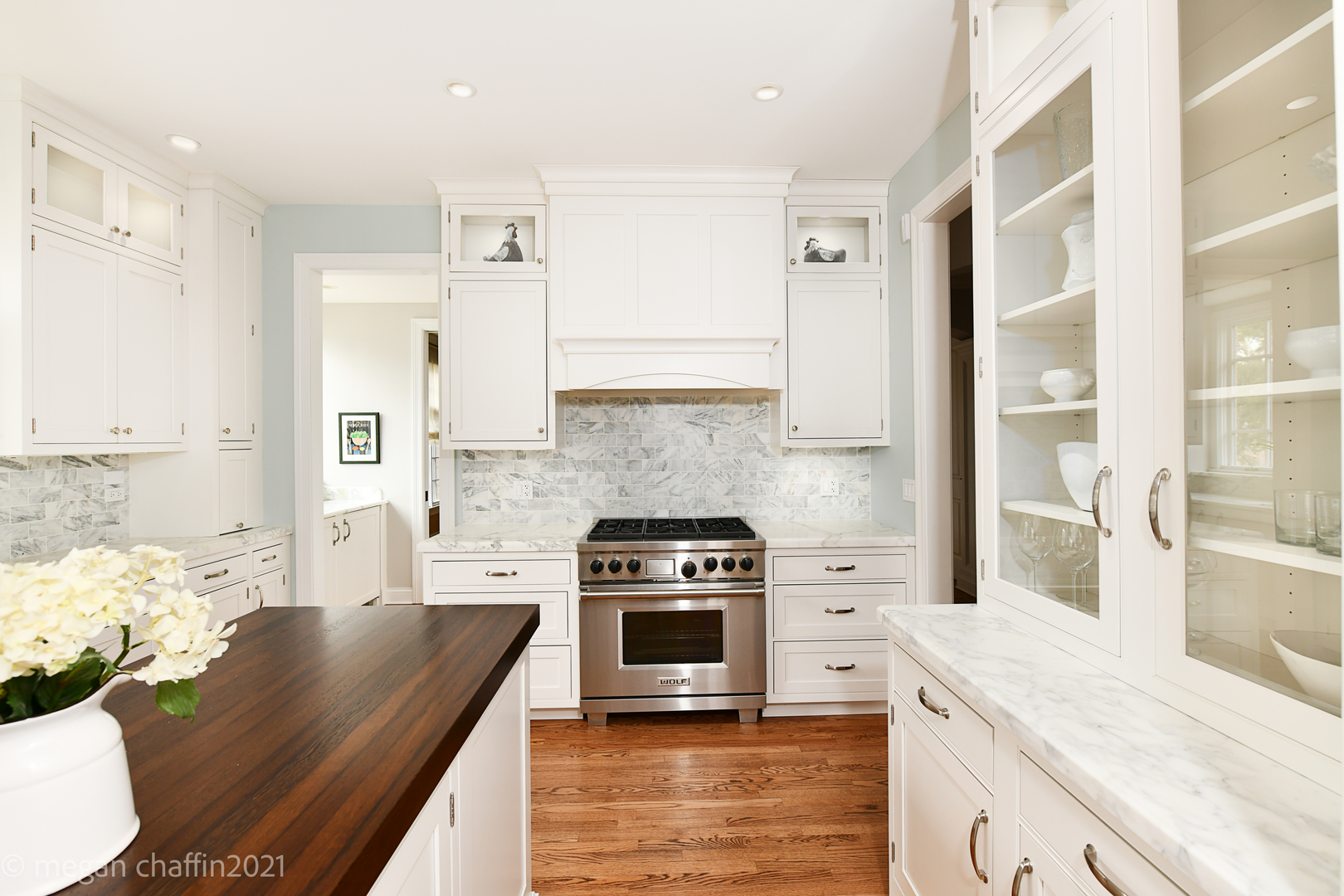 102 Church Road Winnetka, IL 60093 - Photo 13 of 46 a kitchen with stainless steel appliances granite countertop a stove a sink and a refrigerator