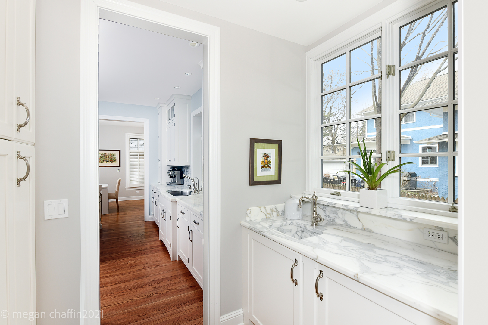 102 Church Road Winnetka, IL 60093 - Photo 16 of 46 a bathroom with a granite countertop sink and a window