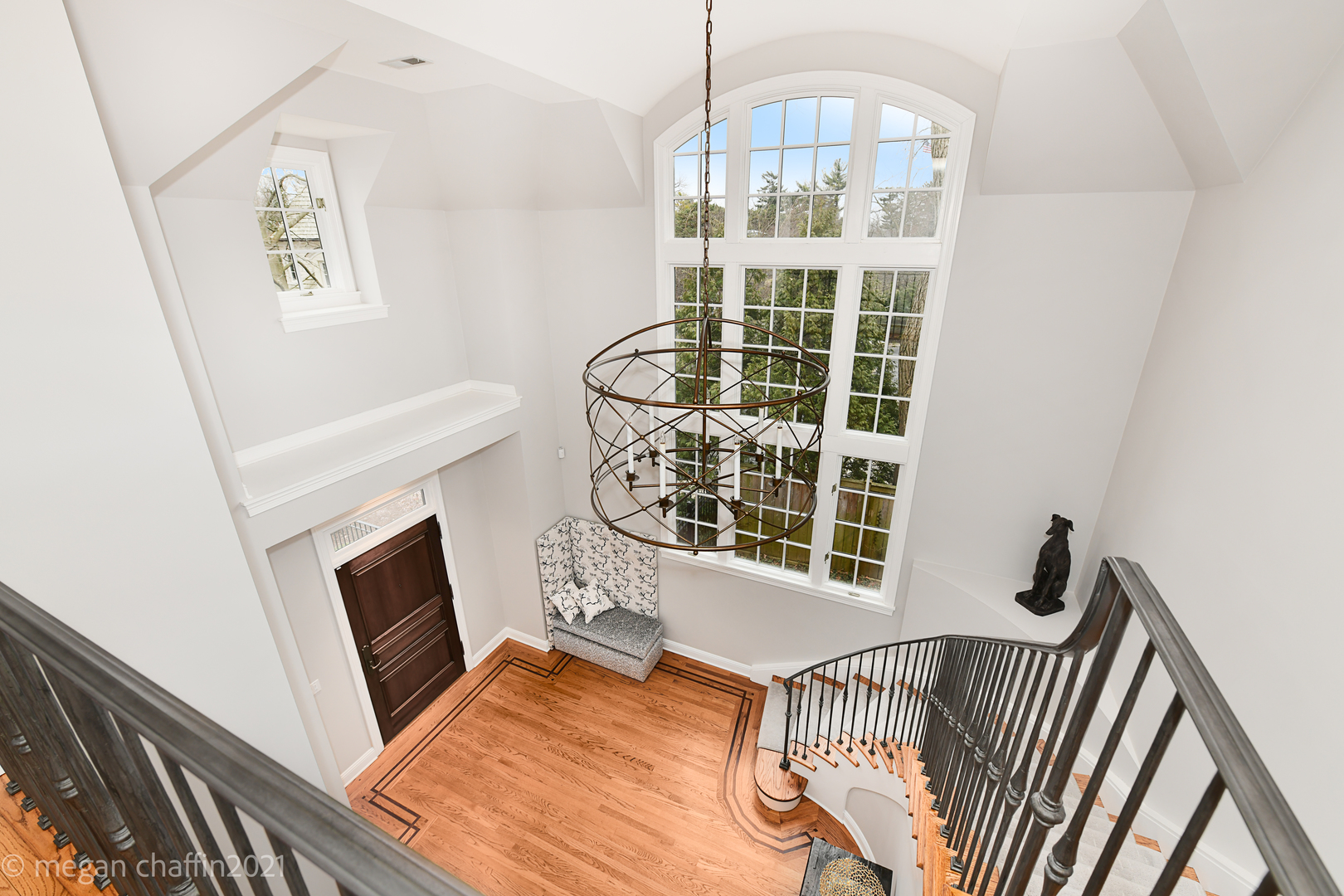 102 Church Road Winnetka, IL 60093 - Photo 22 of 46 a view of a hallway with windows
