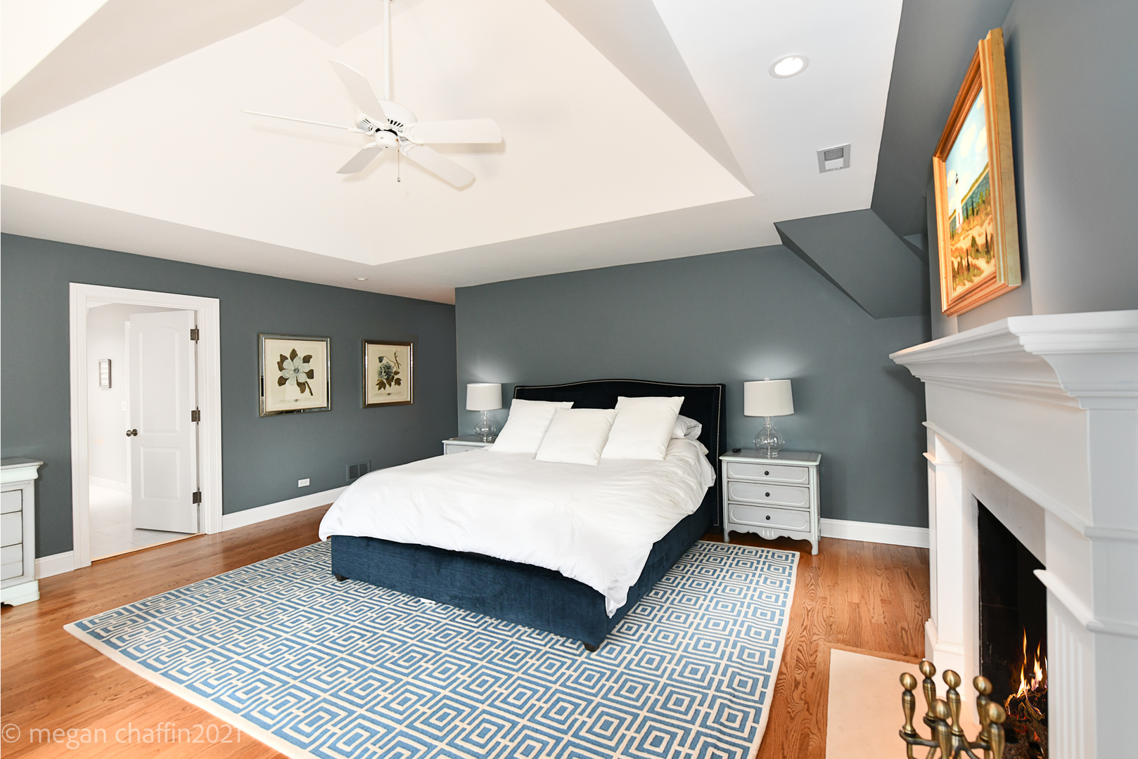 102 Church Road Winnetka, IL 60093 - Photo 24 of 46 a bedroom with a bed and a fireplace