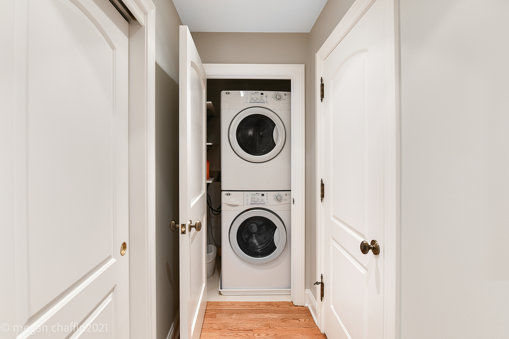 102 Church Road Winnetka, IL 60093 - Photo 33 of 46 a view of a hallway with washer and dryer