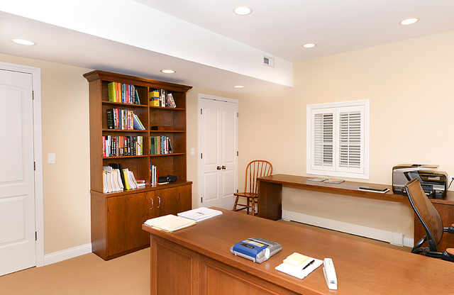 102 Church Road Winnetka, IL 60093 - Photo 39 of 46 a view of a workspace with furniture and cabinet