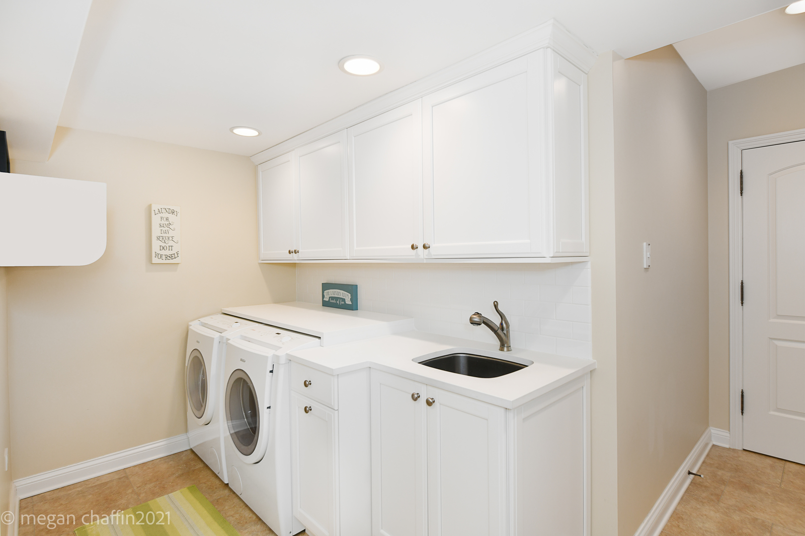 102 Church Road Winnetka, IL 60093 - Photo 41 of 46 a view of storage and utility room with washer and dryer