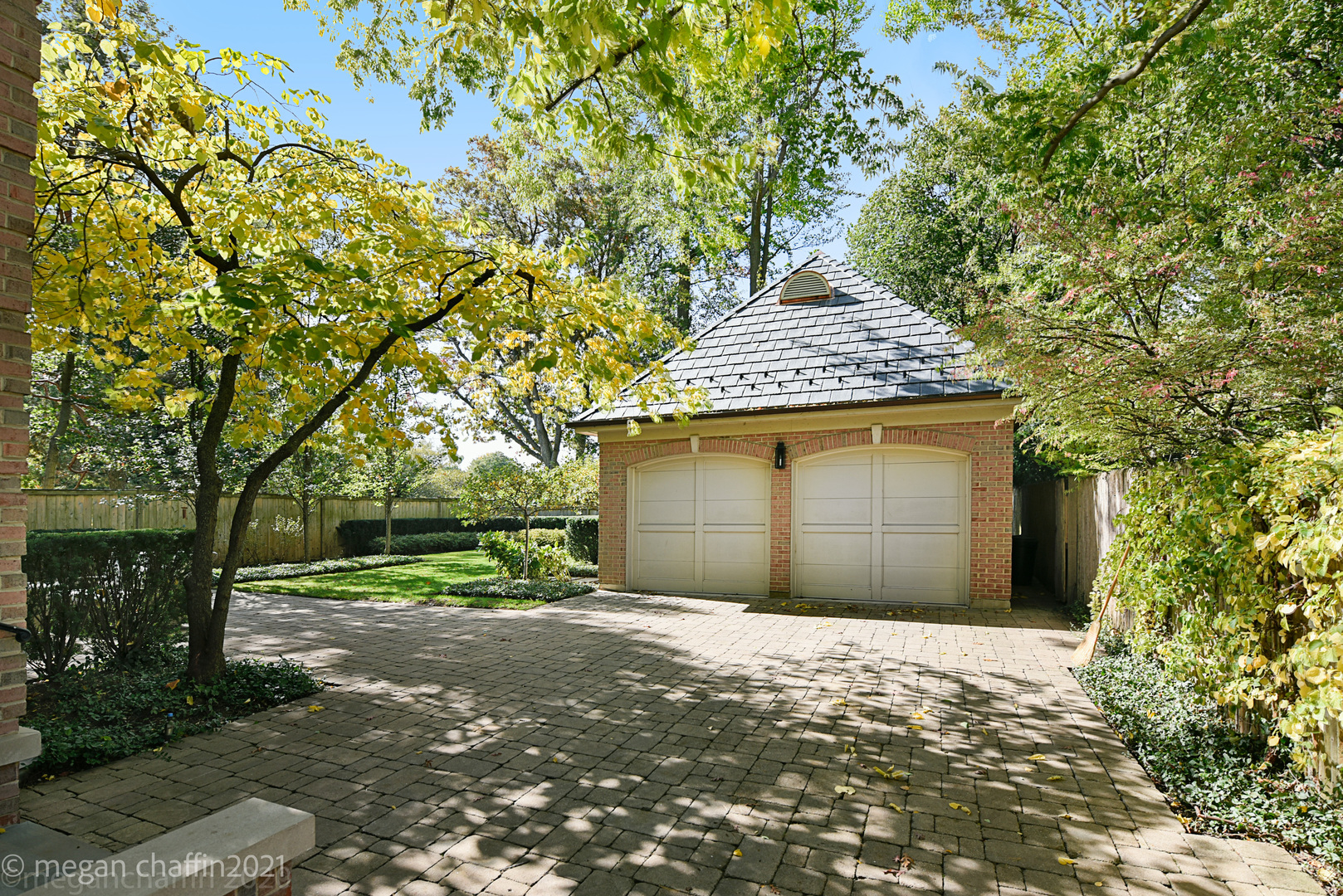 102 Church Road Winnetka, IL 60093 - Photo 45 of 46 a front view of a house with a yard