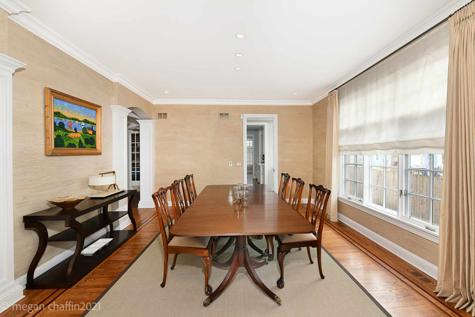 102 Church Road Winnetka, IL 60093 - Photo 8 of 46 a view of a dining room with furniture a rug and wooden floor