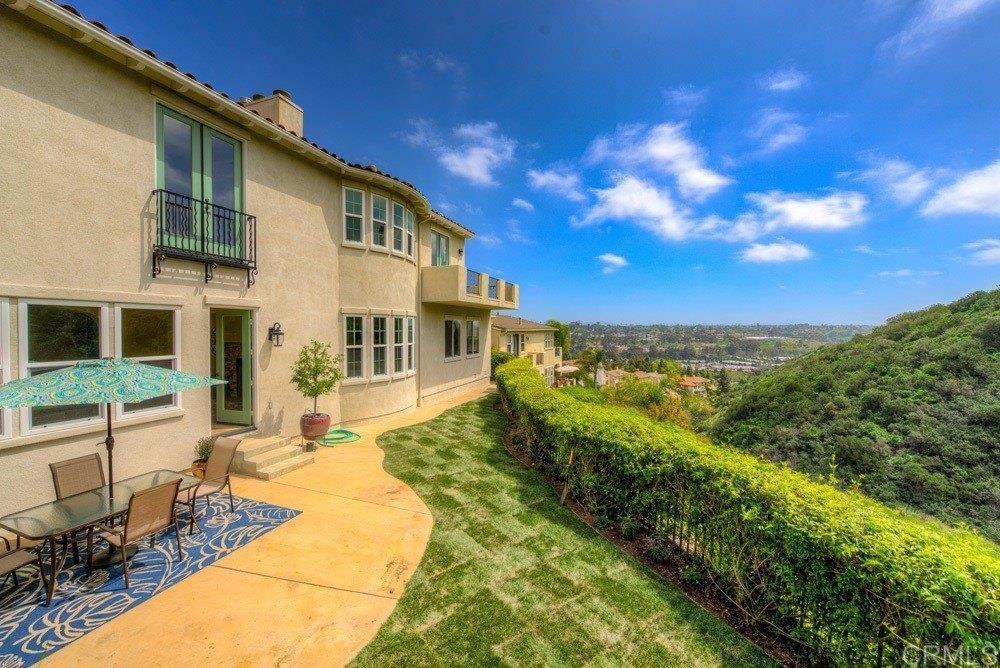 2665 Ridgegate Row La Jolla, CA 92037 - Photo 1 of 1 a front view of a house with a yard