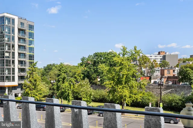 a view of a balcony with chairs