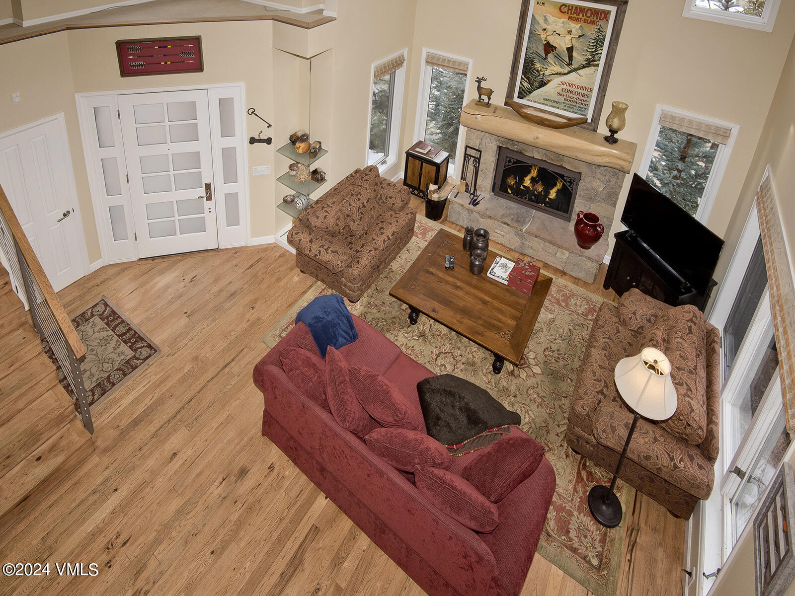 1968 Vermont Road Vail, CO 81657 - Photo 24 of 69 a living room with furniture and a flat screen tv
