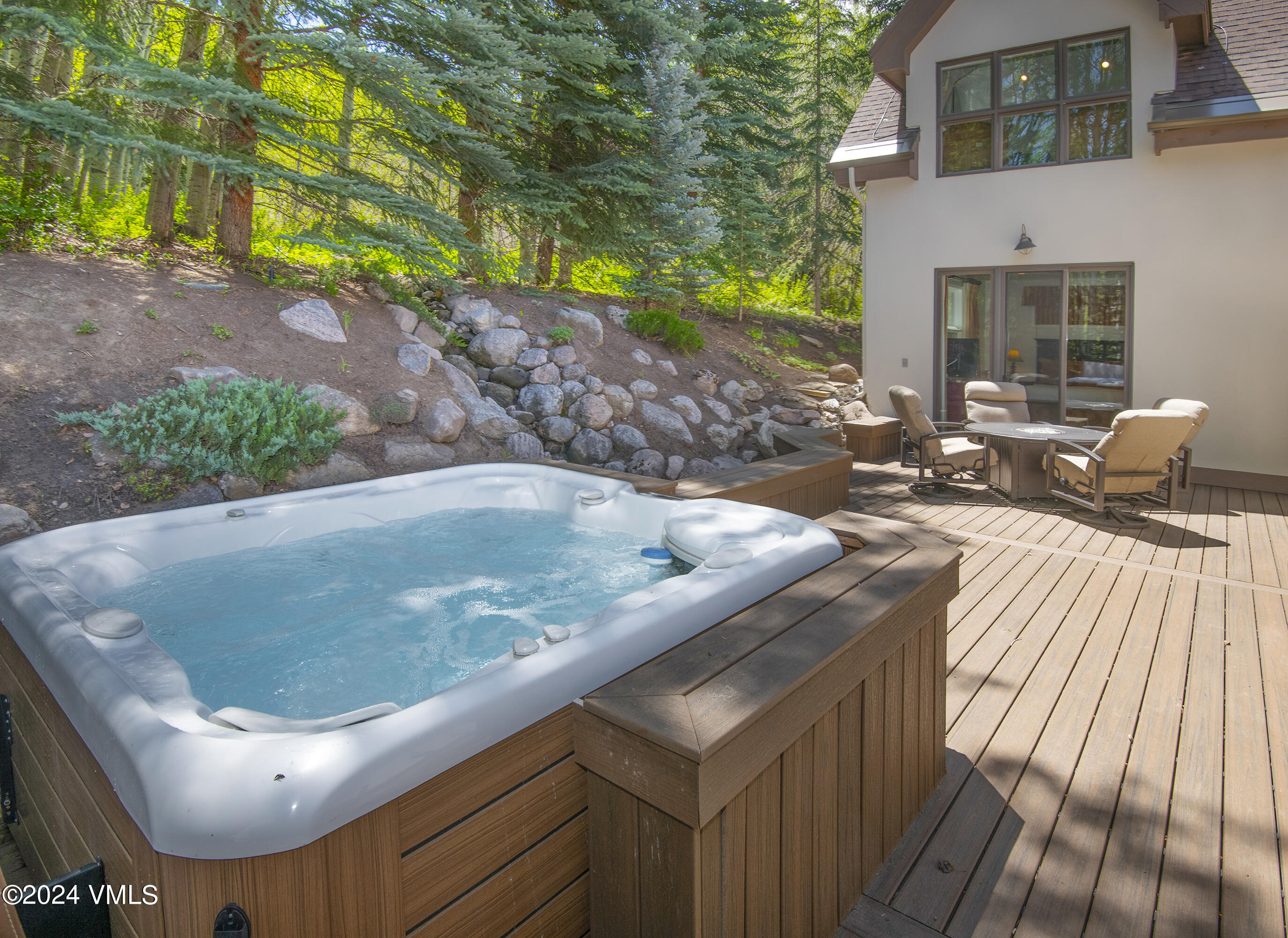 1968 Vermont Road Vail, CO 81657 - Photo 3 of 69 a view of a backyard with sitting area