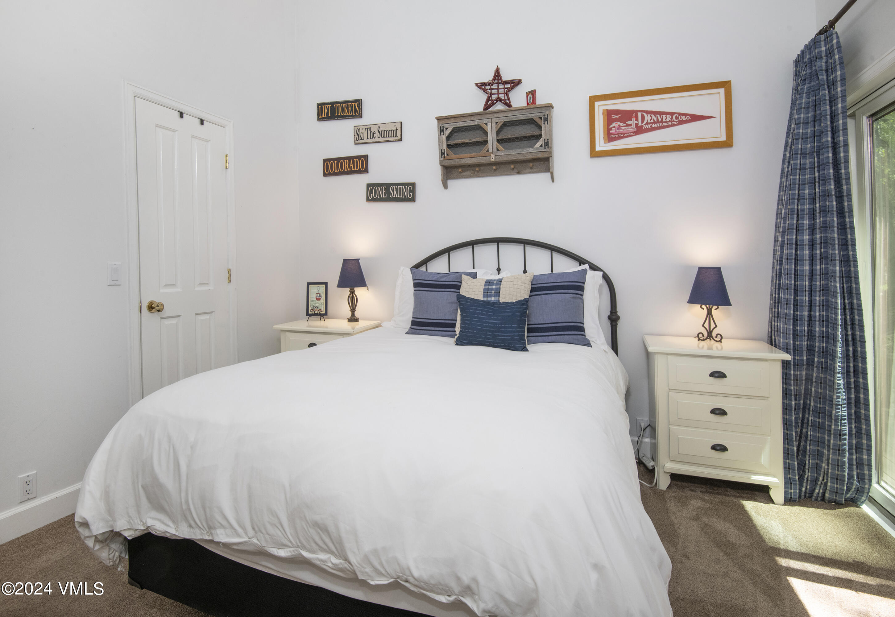 1968 Vermont Road Vail, CO 81657 - Photo 33 of 69 a bedroom with a bed and a dresser