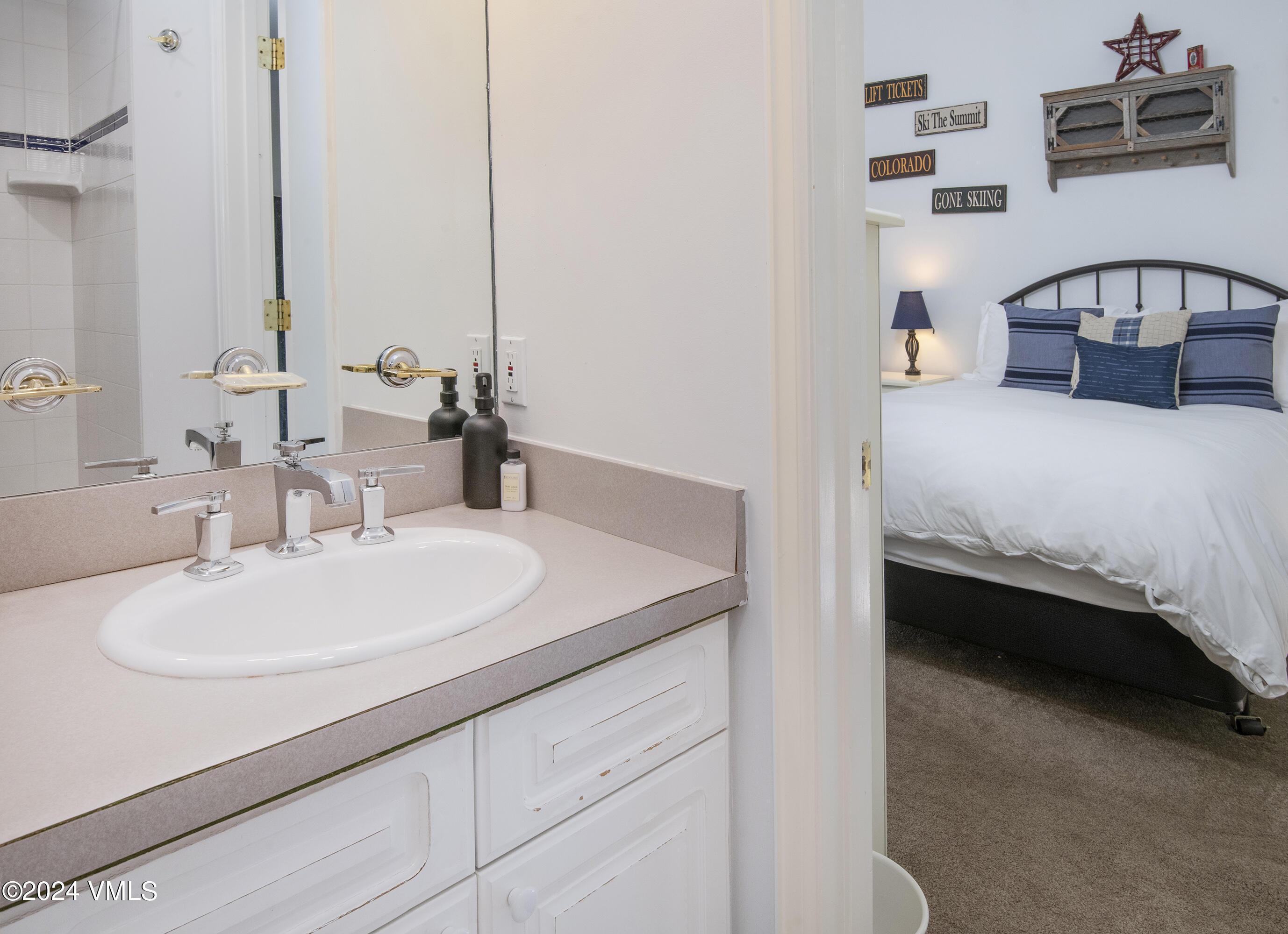 1968 Vermont Road Vail, CO 81657 - Photo 35 of 69 a en suite bathroom with a double vanity sink