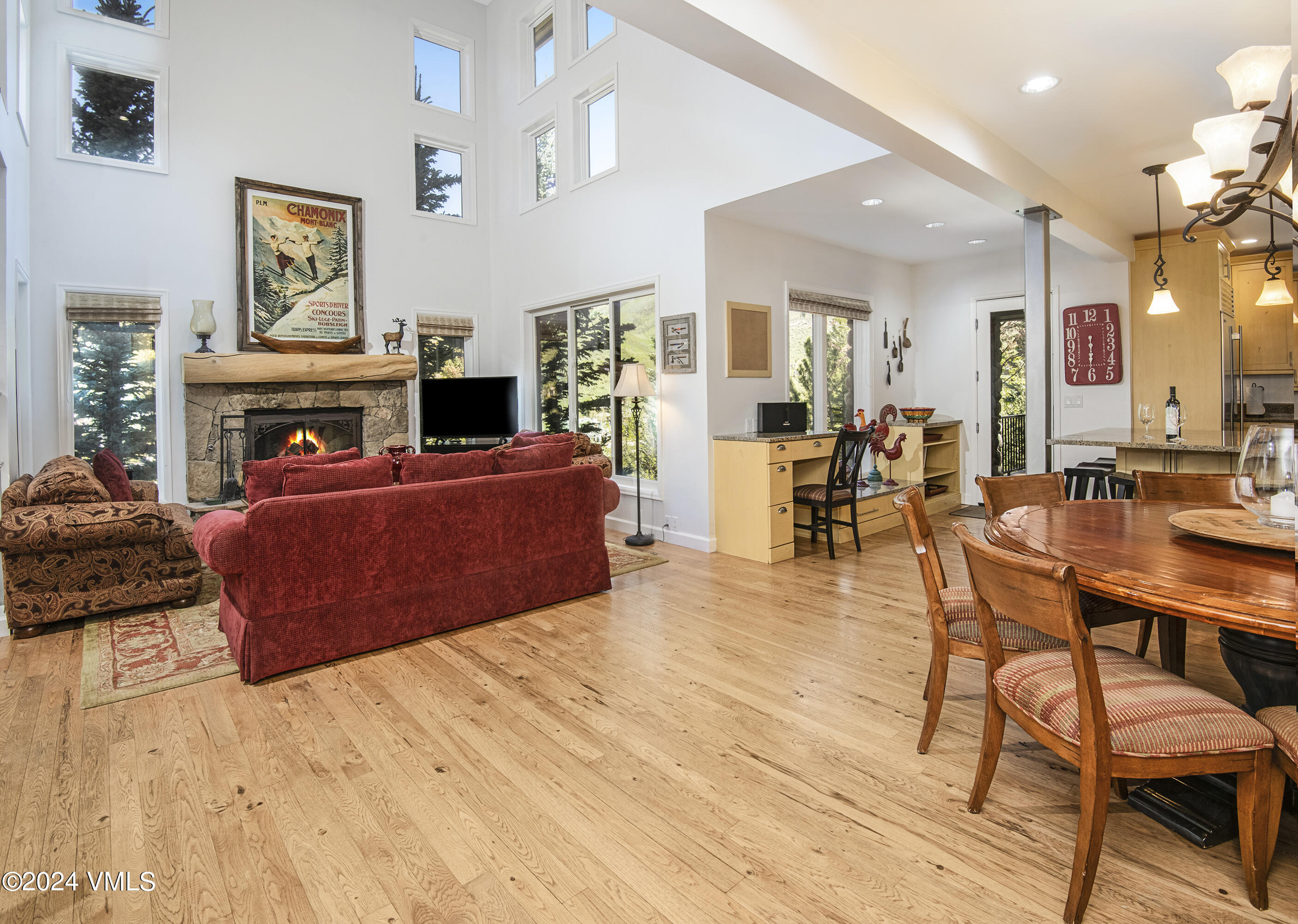 1968 Vermont Road Vail, CO 81657 - Photo 4 of 69 a living room with furniture and a flat screen tv