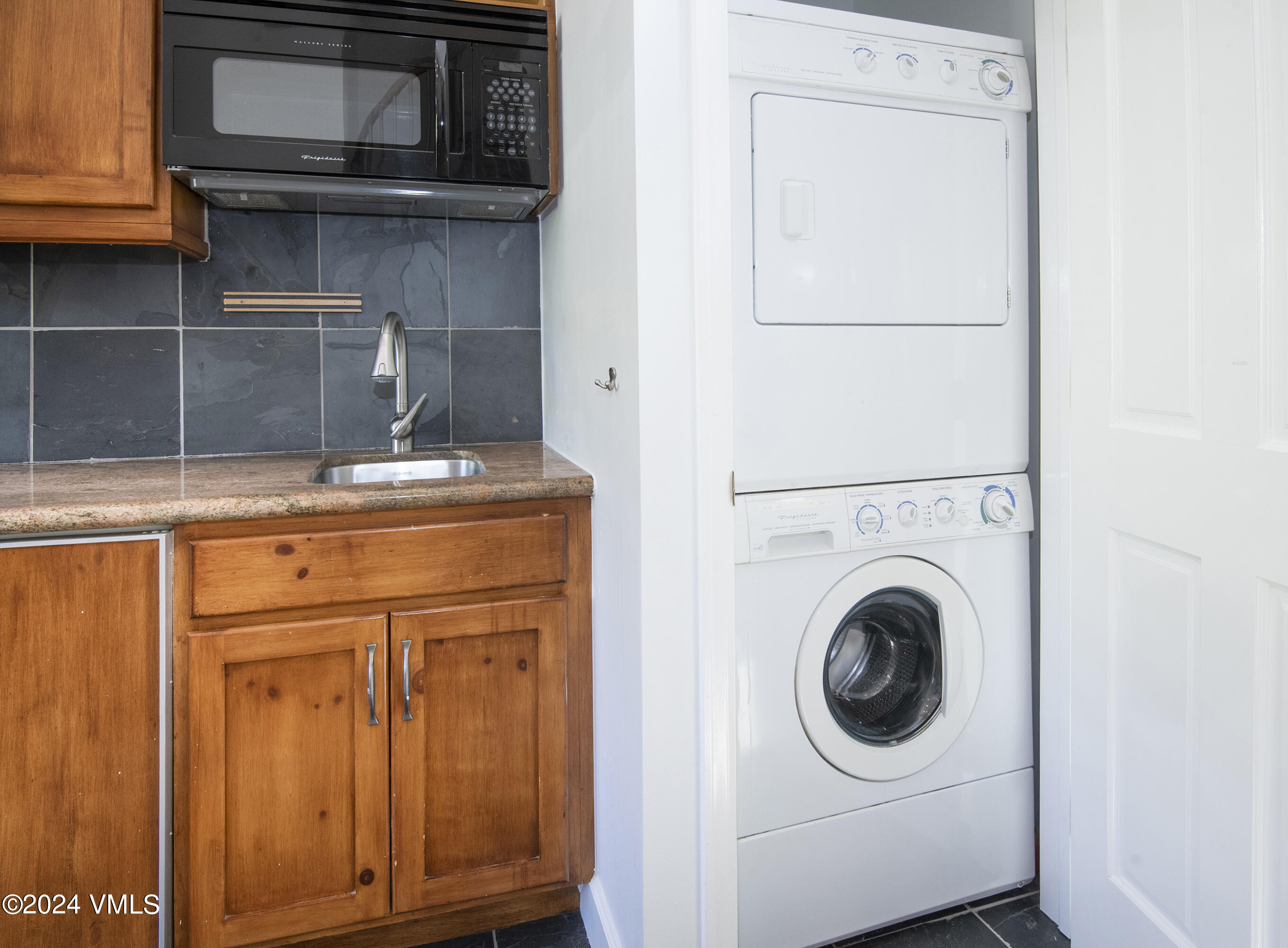 1968 Vermont Road Vail, CO 81657 - Photo 41 of 69 a utility room with dryer and washer