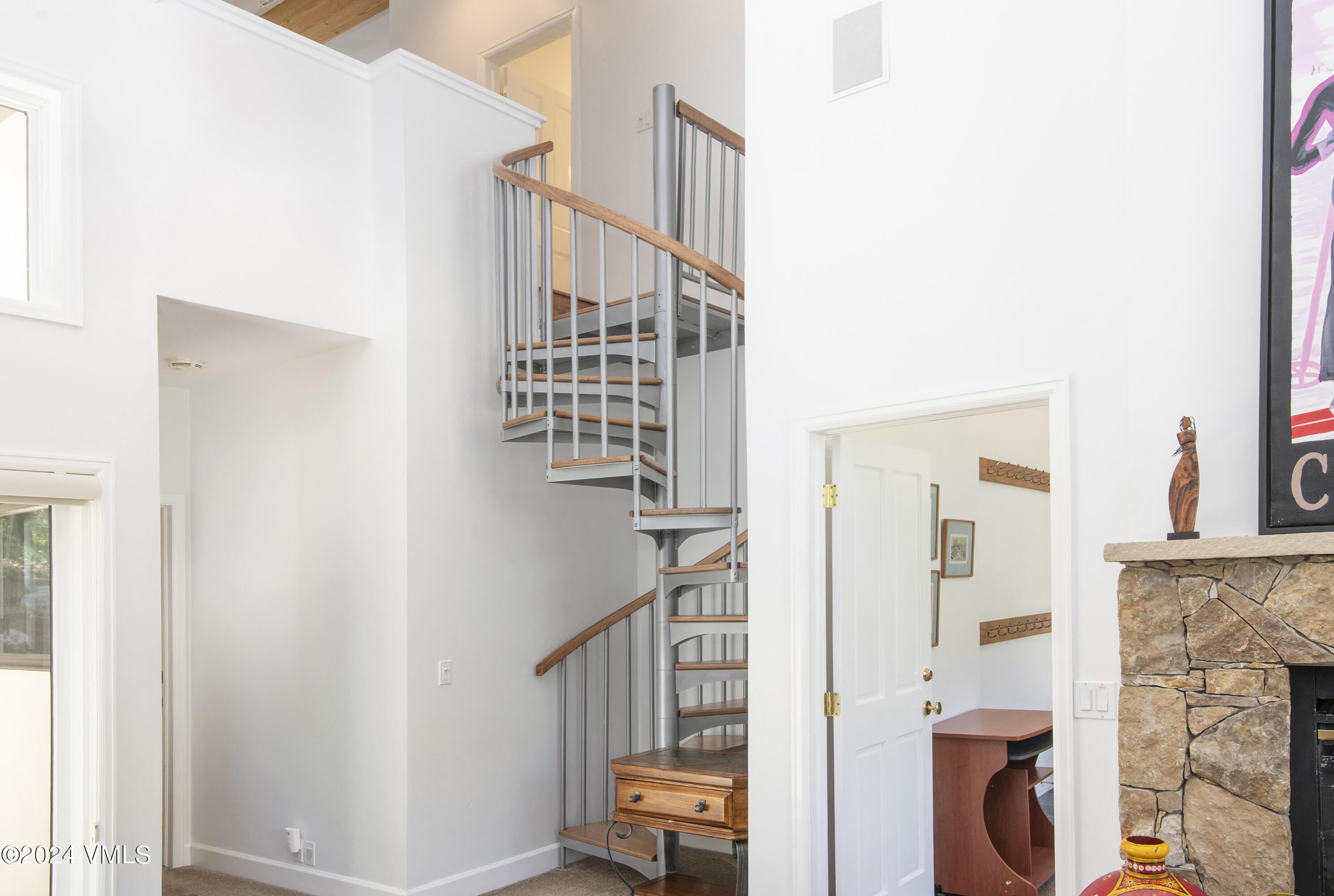 1968 Vermont Road Vail, CO 81657 - Photo 49 of 69 a view of staircase with white walls and railing