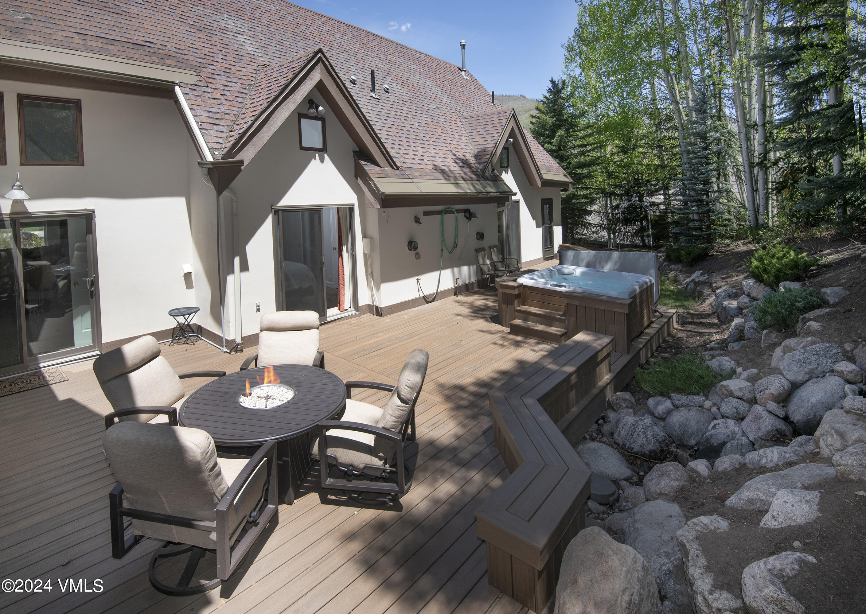 1968 Vermont Road Vail, CO 81657 - Photo 55 of 69 a view of a house with backyard and sitting area