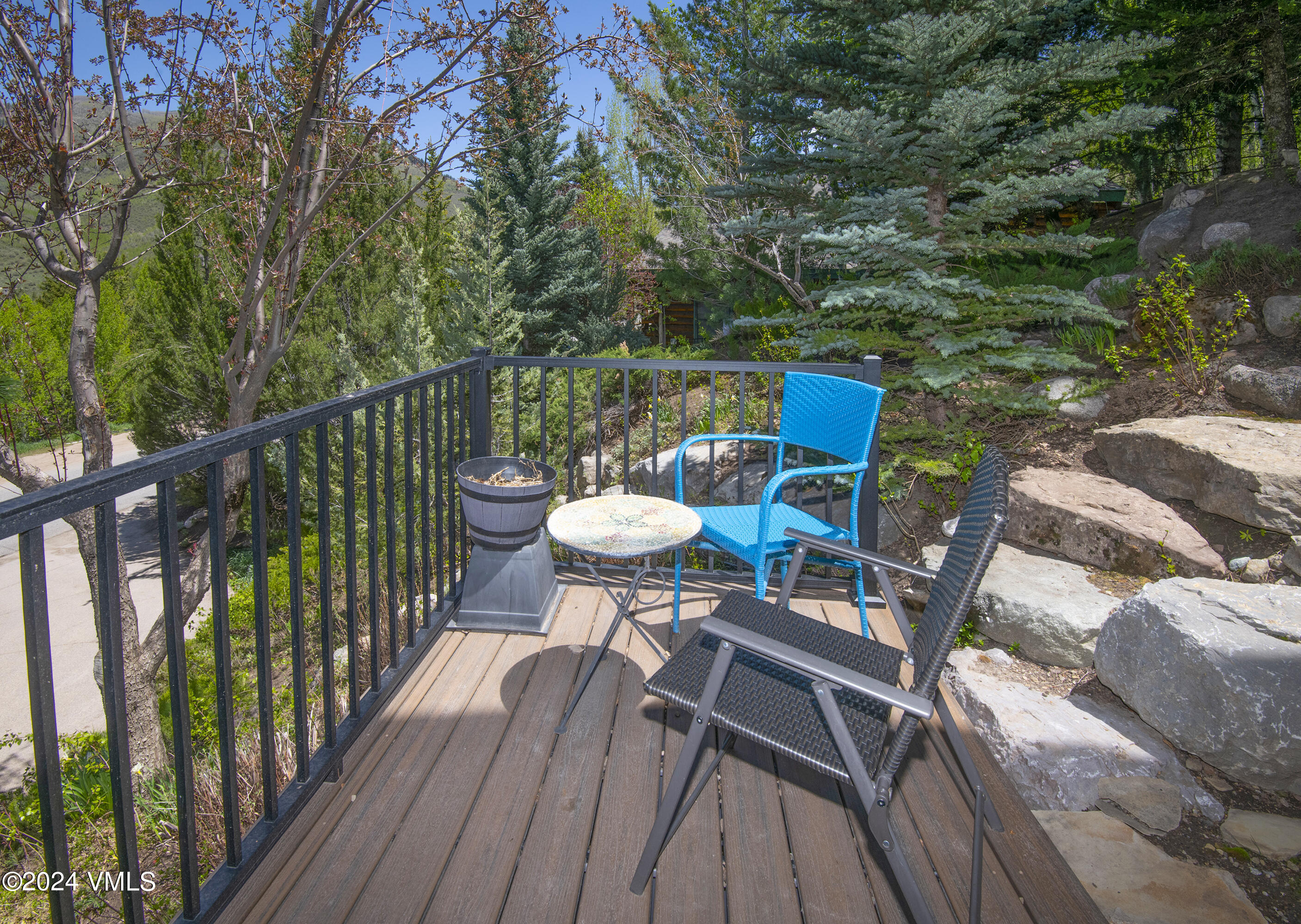1968 Vermont Road Vail, CO 81657 - Photo 58 of 69 a view of a deck with furniture and a backyard