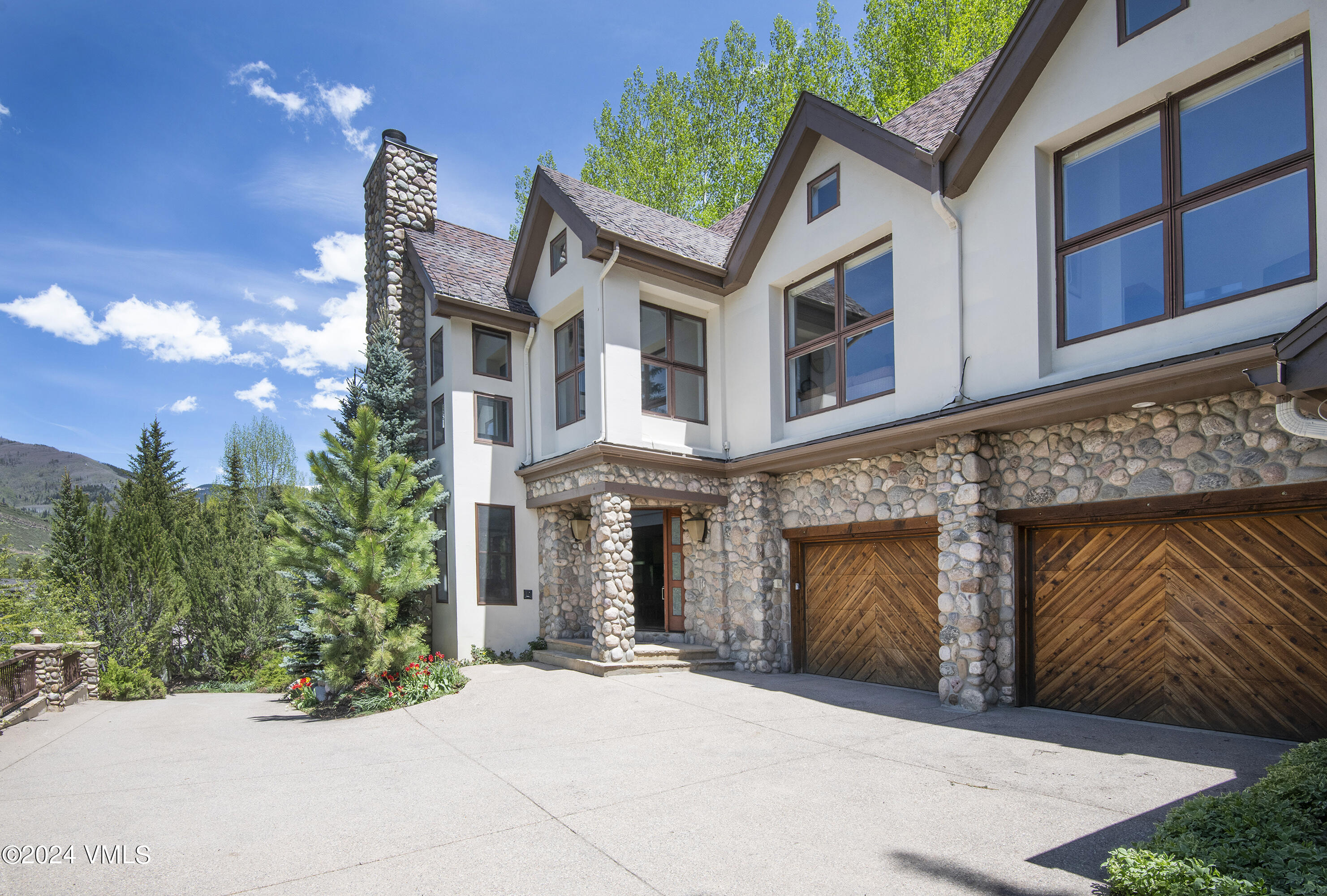 1968 Vermont Road Vail, CO 81657 - Photo 60 of 69 a front view of a house with yard