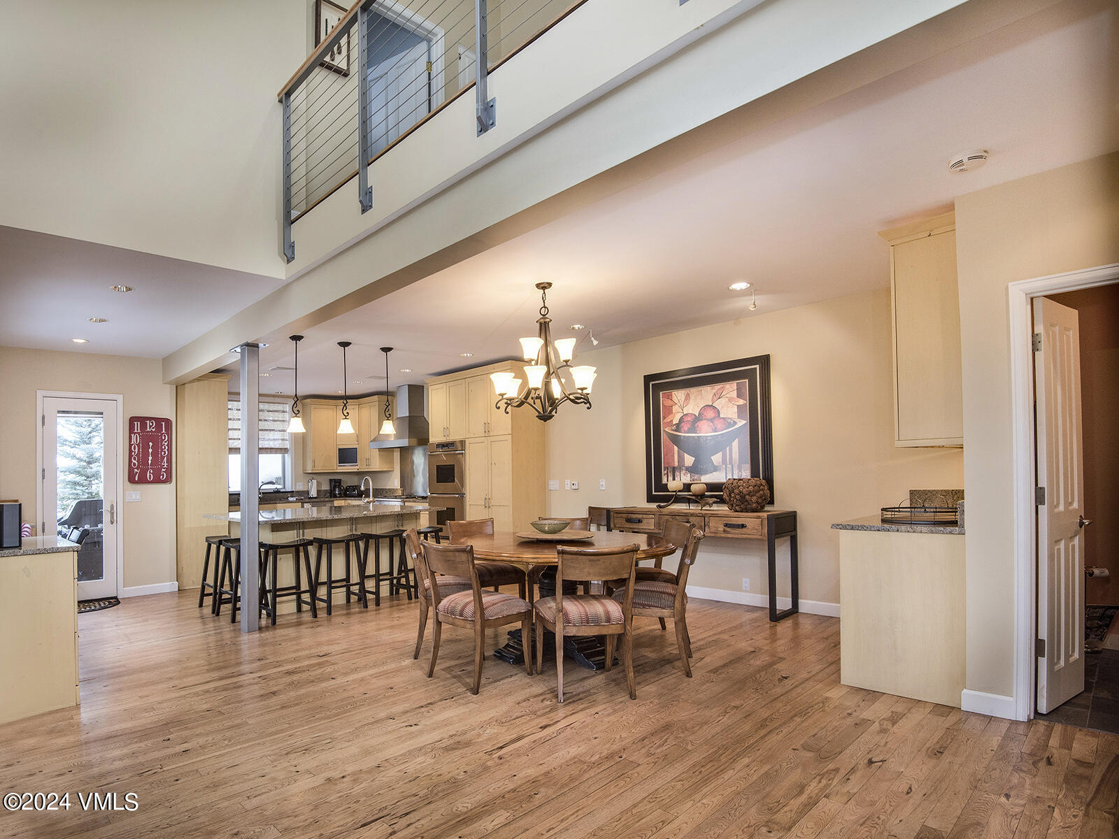 1968 Vermont Road Vail, CO 81657 - Photo 6 of 69 a view of a dining room with furniture kitchen and wooden floor