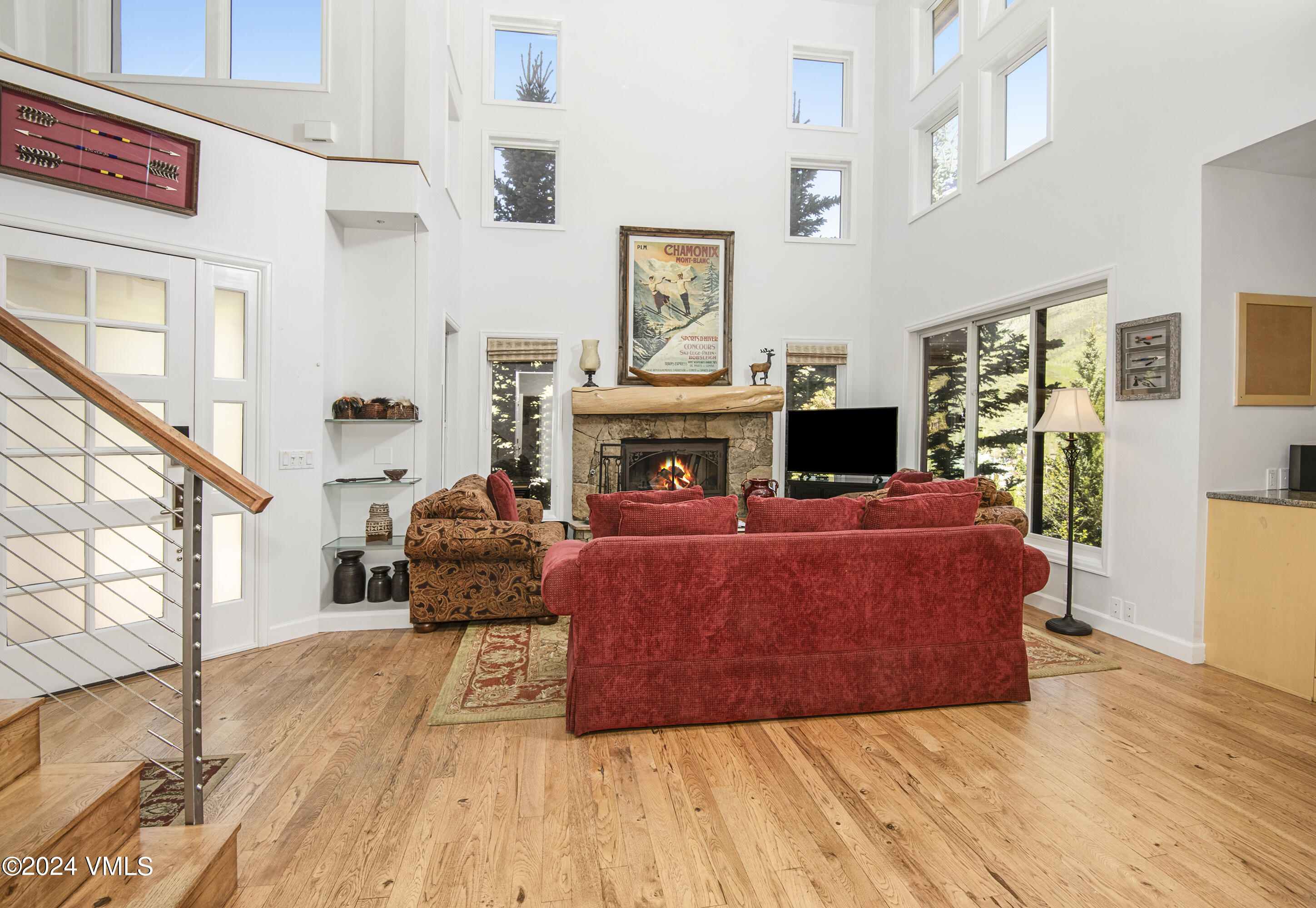 1968 Vermont Road Vail, CO 81657 - Photo 9 of 69 a living room with furniture and a fireplace
