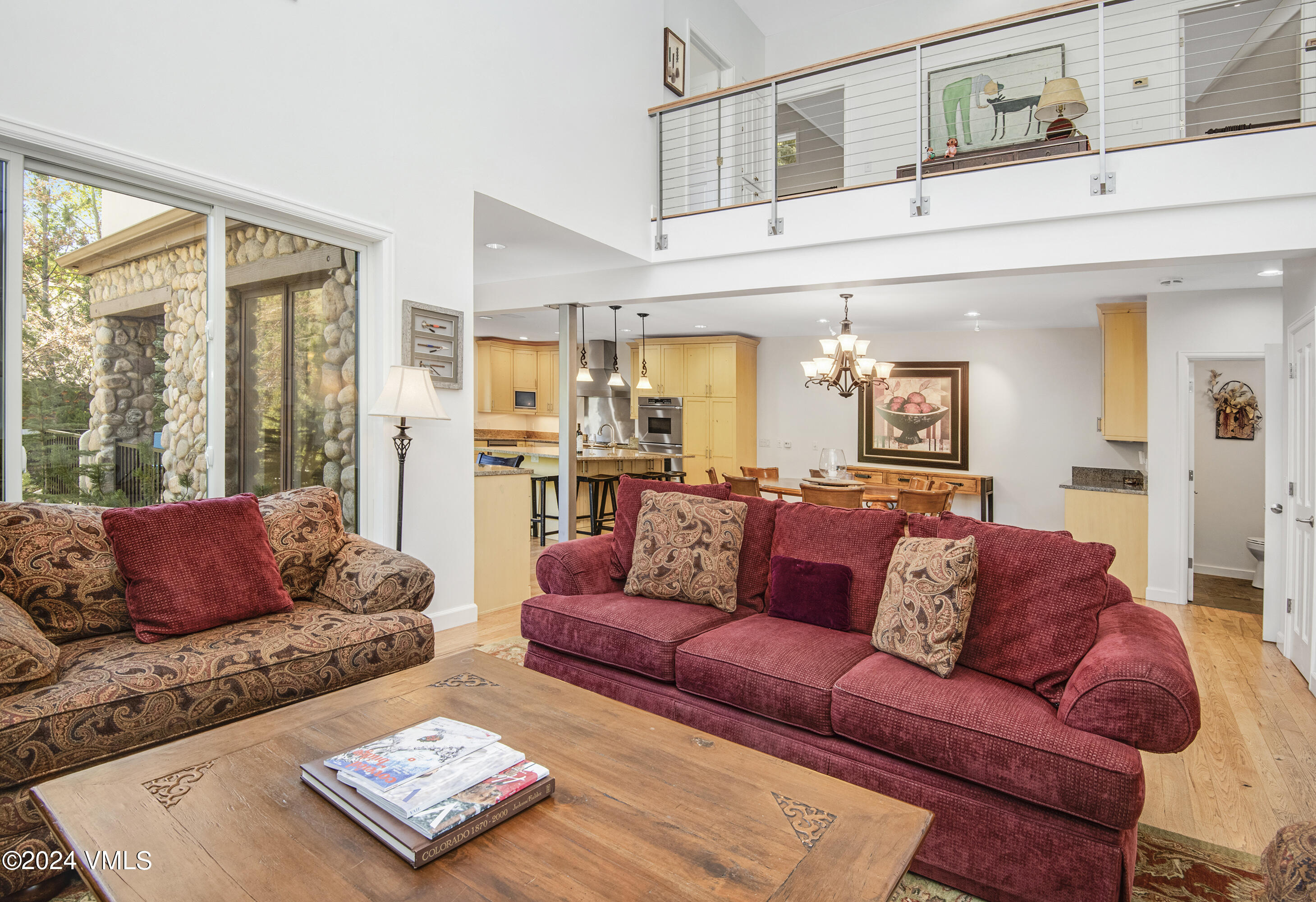 1968 Vermont Road Vail, CO 81657 - Photo 10 of 69 a living room with furniture and a large window