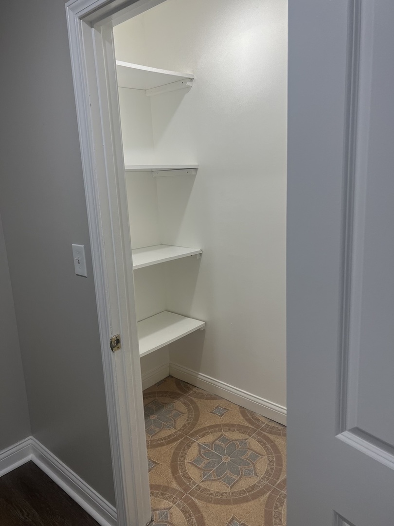 1434 South St Louis Avenue, Unit 1 Chicago, IL 60623 - Photo 8 of 9 a view of an empty room