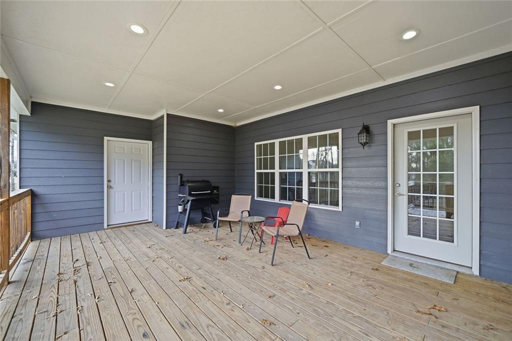 1006 Owens Store Road Canton, GA 30115 - Photo 32 of 48 a view of a chairs with wooden floor