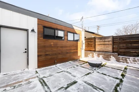 a backyard of a house with seating space