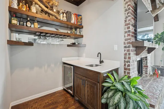 a view of a livingroom with furniture window and wooden floor