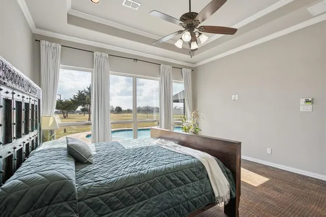 a spacious bathroom with a bathtub and a sink