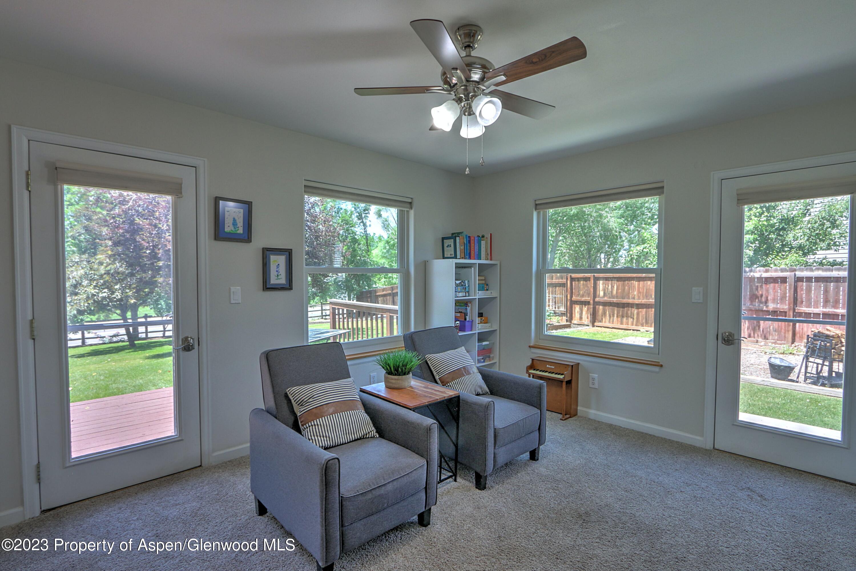 1527 Graham Court Rifle, CO 81650 - Photo 16 of 32 a living room with furniture and a window