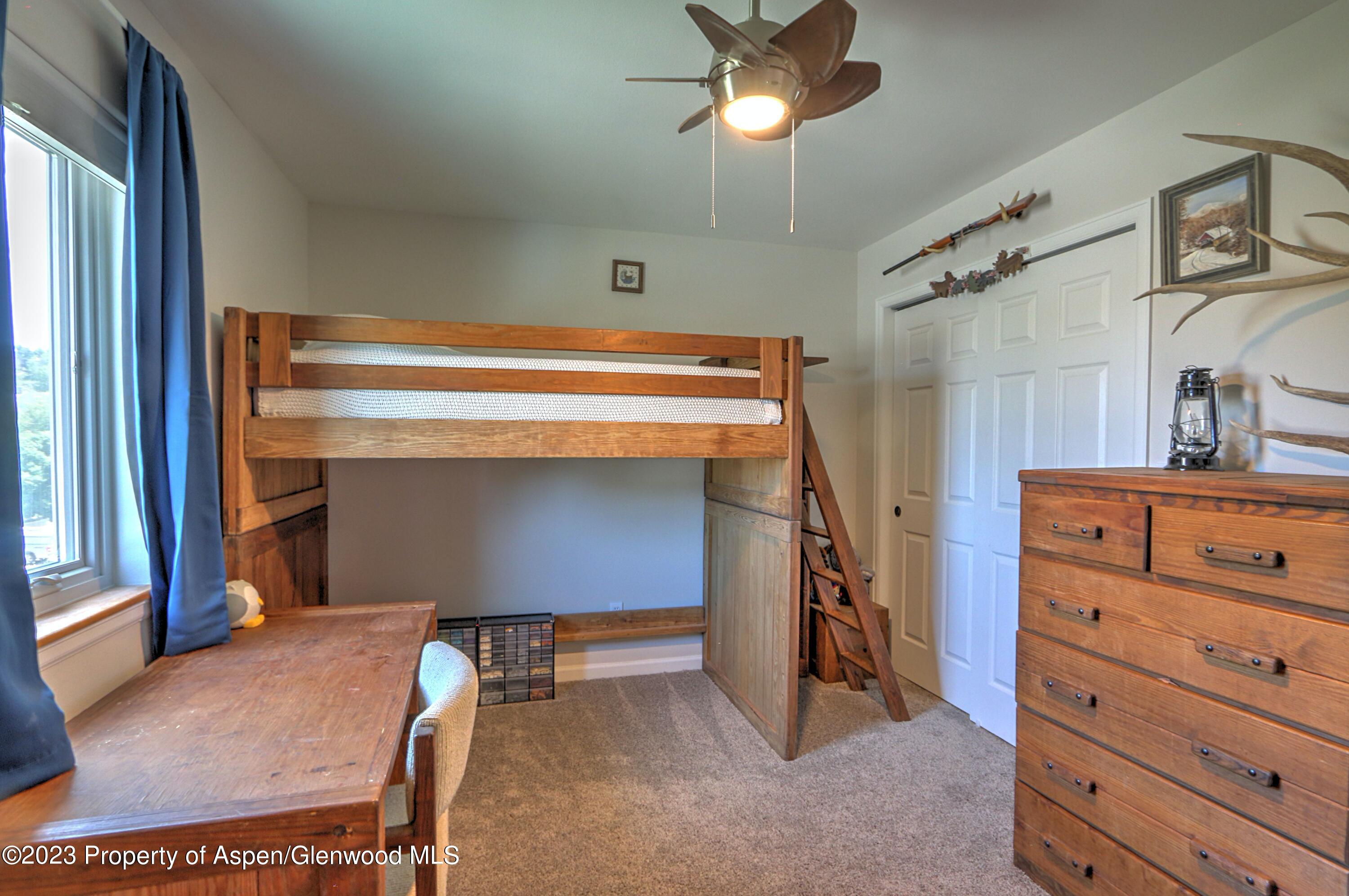 1527 Graham Court Rifle, CO 81650 - Photo 24 of 32 a view of room with furniture and a ceiling fan