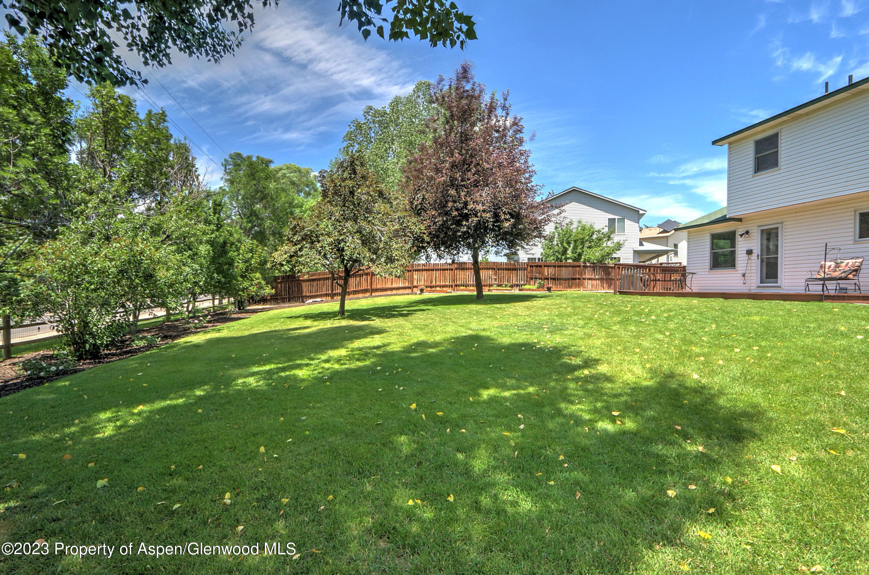 1527 Graham Court Rifle, CO 81650 - Photo 26 of 32 a view of a park with a house in the background
