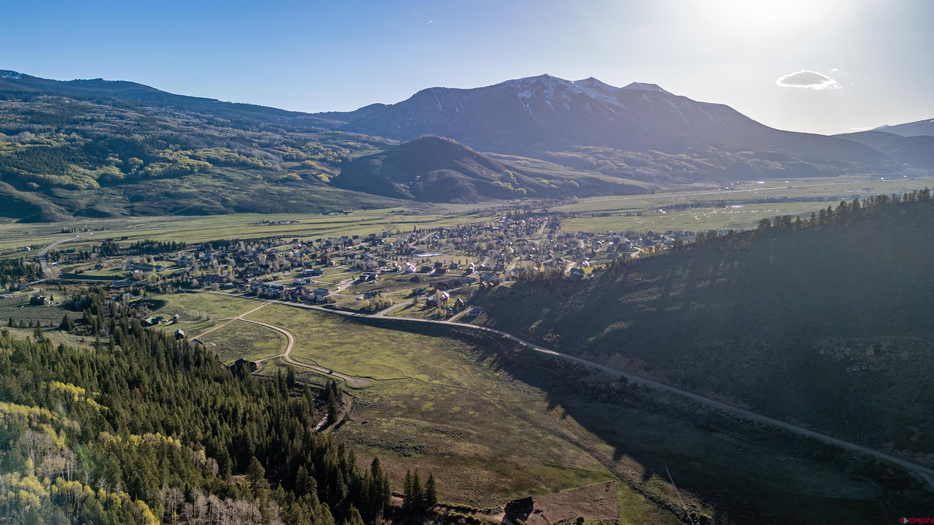 158 Clark Way Crested Butte, CO 81224 - Photo 33 of 35 a view of a lake in middle of the forest