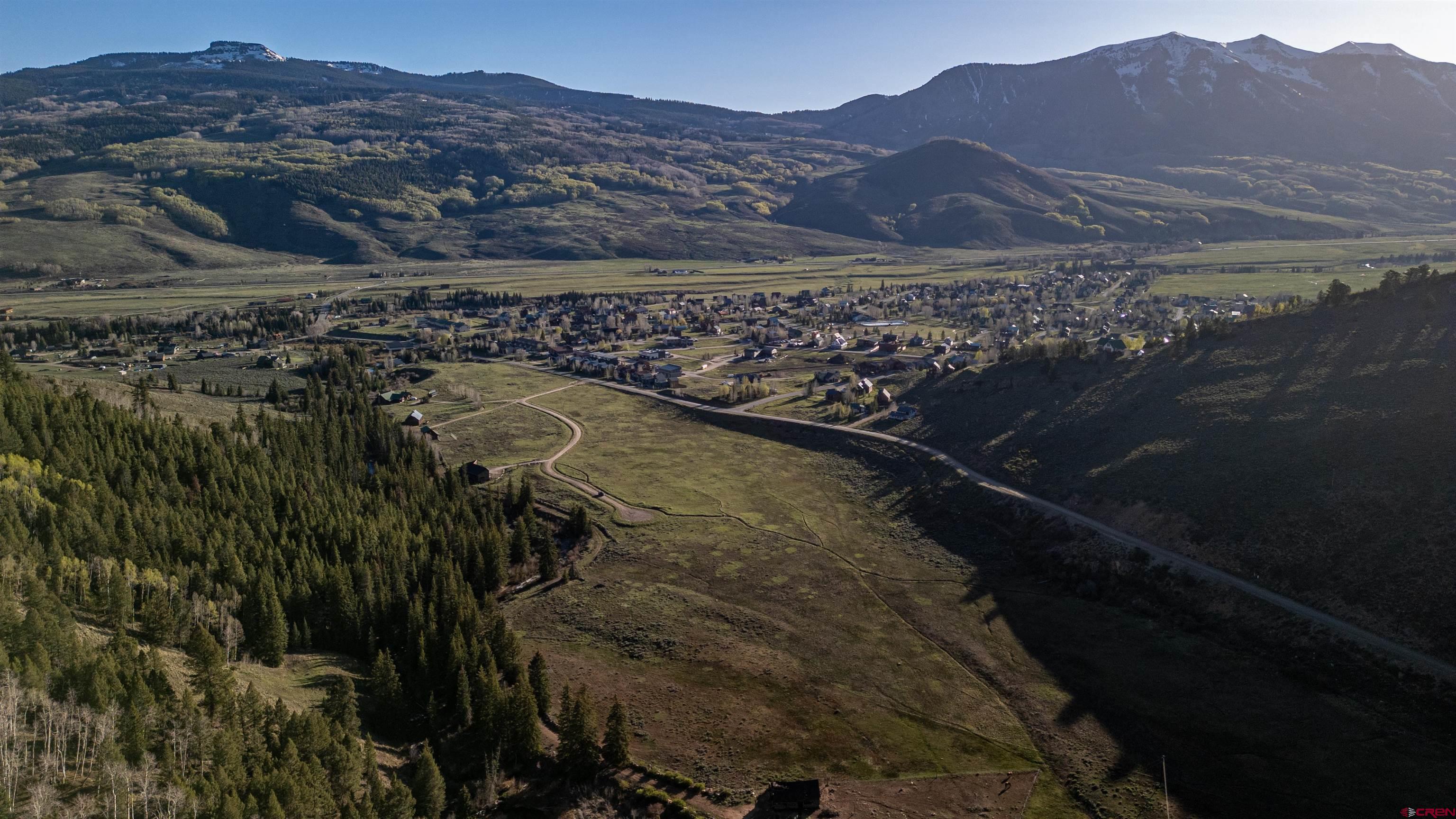 158 Clark Way Crested Butte, CO 81224 - Photo 4 of 35 a view of a house with a yard