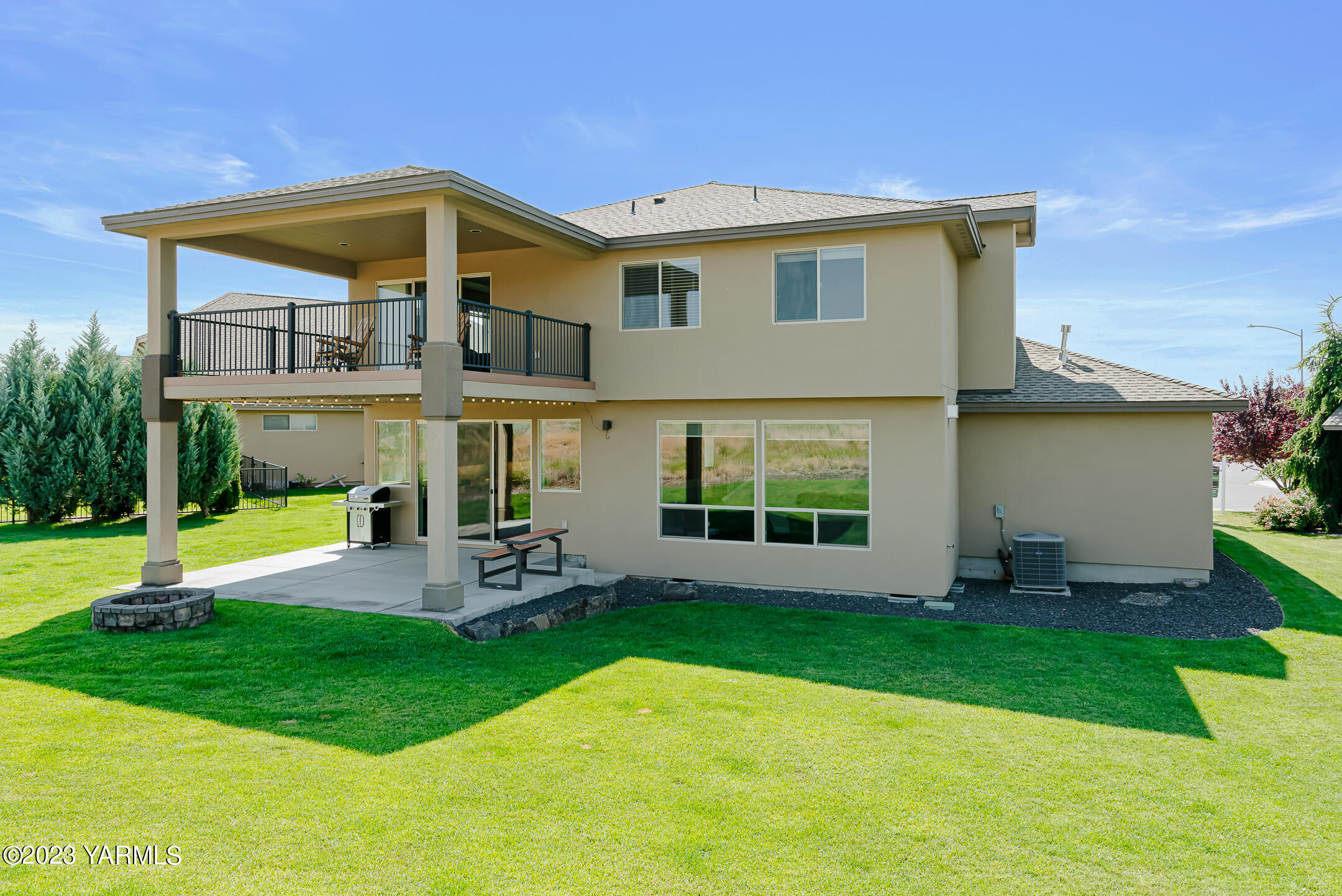 2978 Crosswater Loop Richland, WA 99354 - Photo 32 of 34 a front view of house with yard and outdoor seating