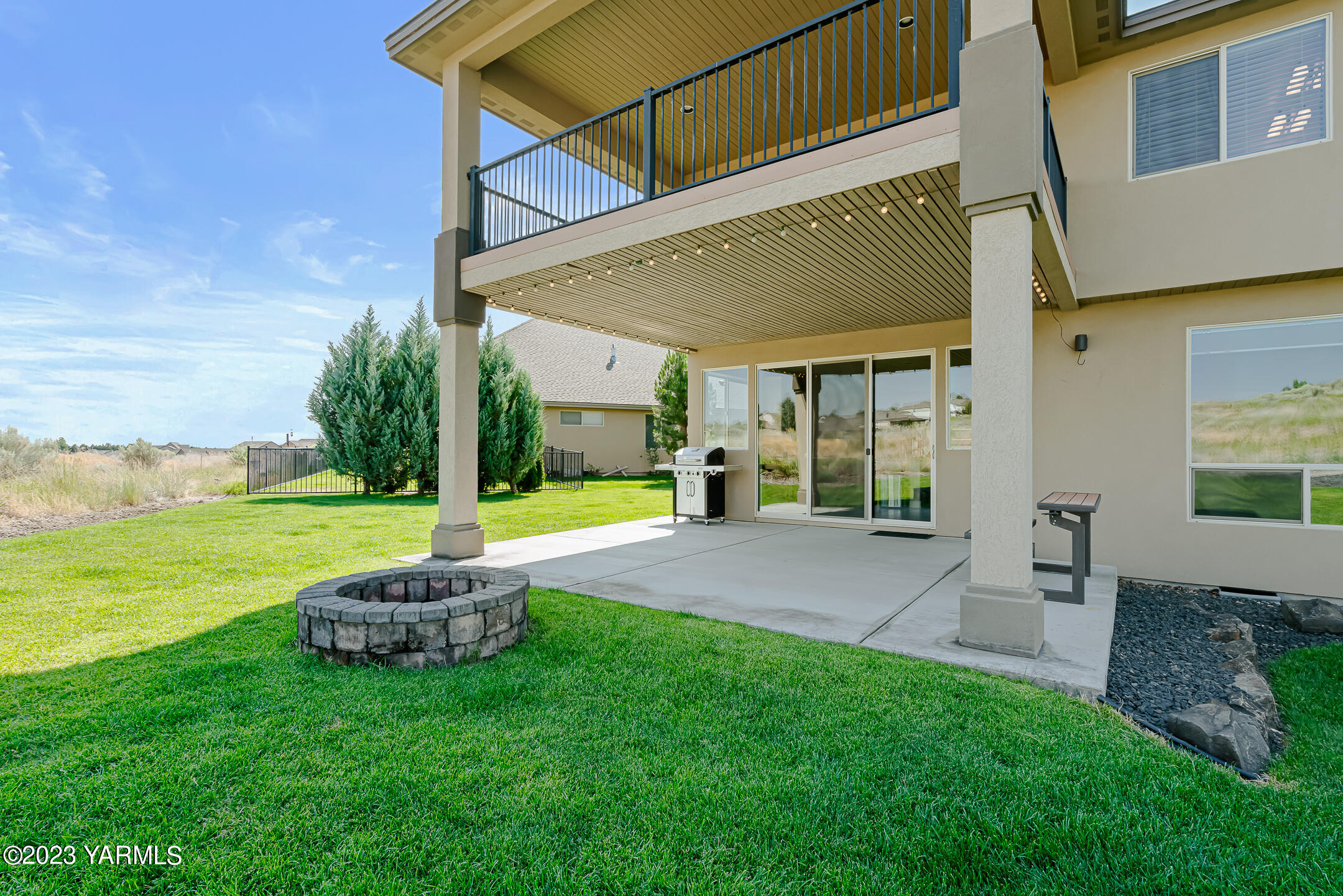 2978 Crosswater Loop Richland, WA 99354 - Photo 34 of 34 a view of a house with backyard porch and garden