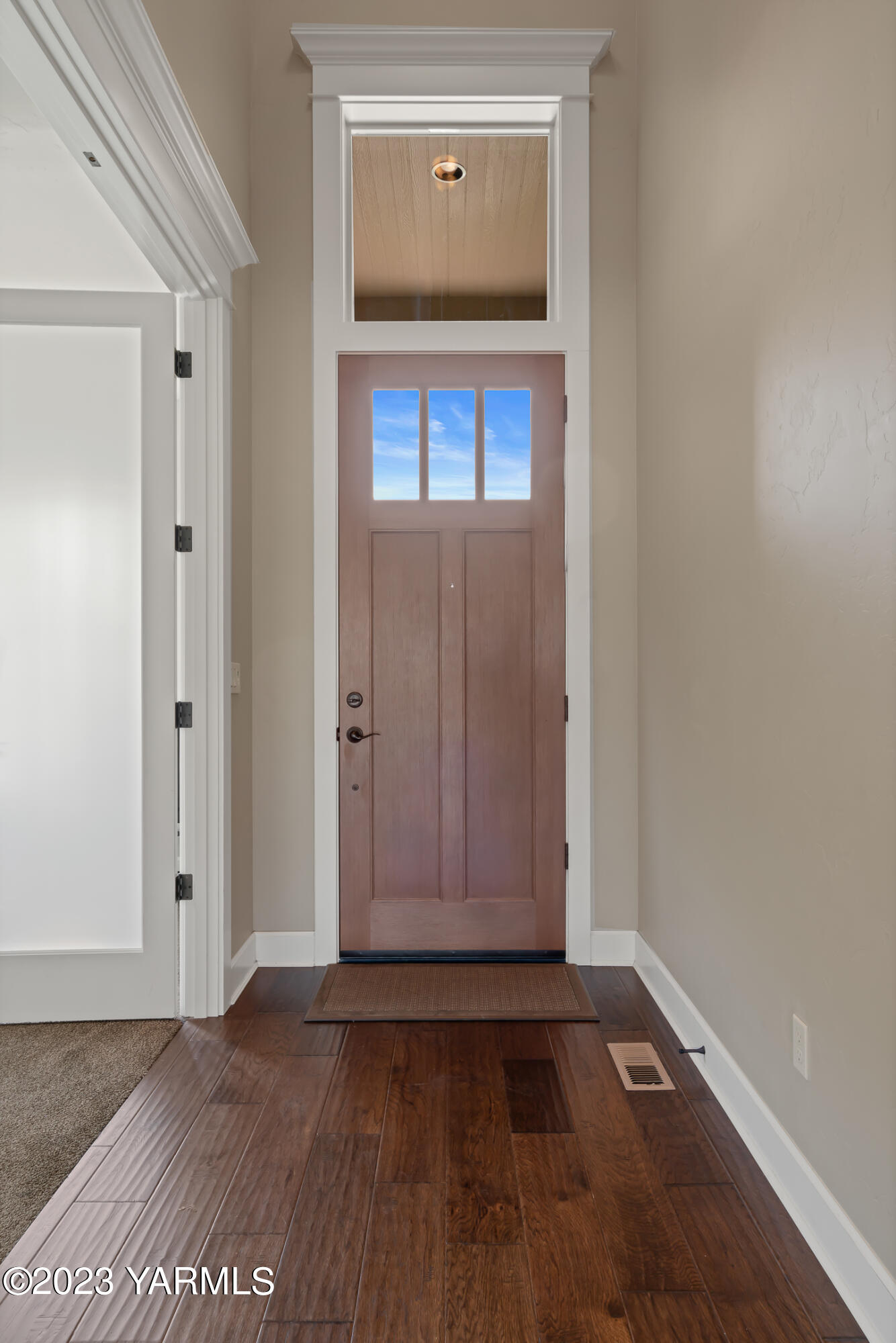 2978 Crosswater Loop Richland, WA 99354 - Photo 4 of 34 a view of an empty room with wooden floor and a window