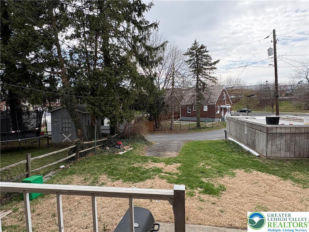 754 East Washington Avenue Bethlehem, PA 18017 - Photo 18 of 19 a yard with some trees in the background