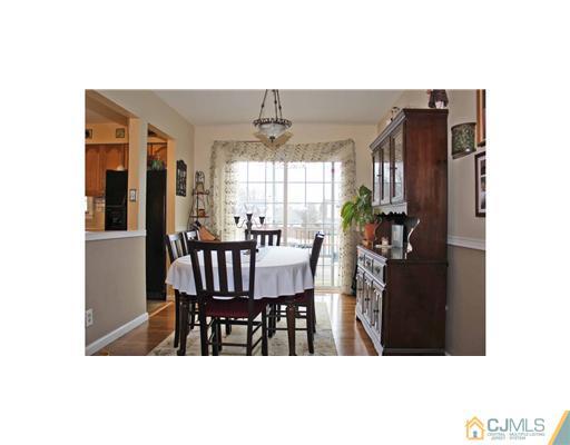17 Monaghan Road Edison, NJ 08817 - Photo 3 of 25 a view of a dining room with furniture and window