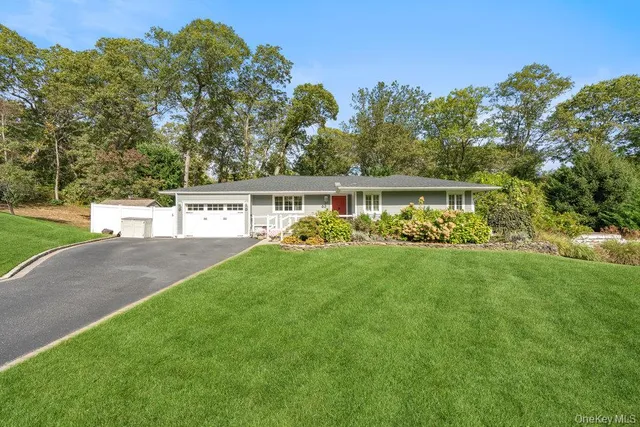 a view of house with swimming pool yard and outdoor seating