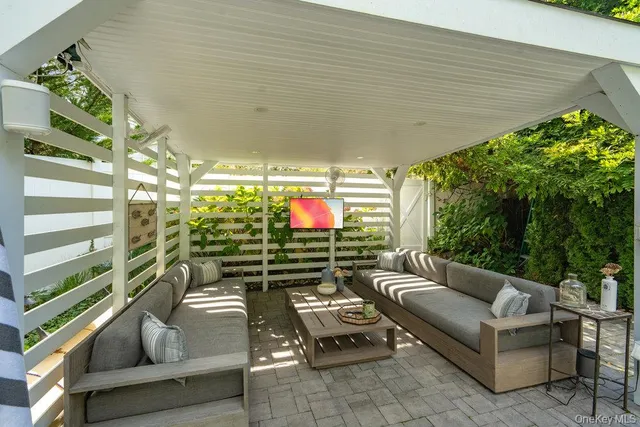 a outdoor living space with furniture and garden view
