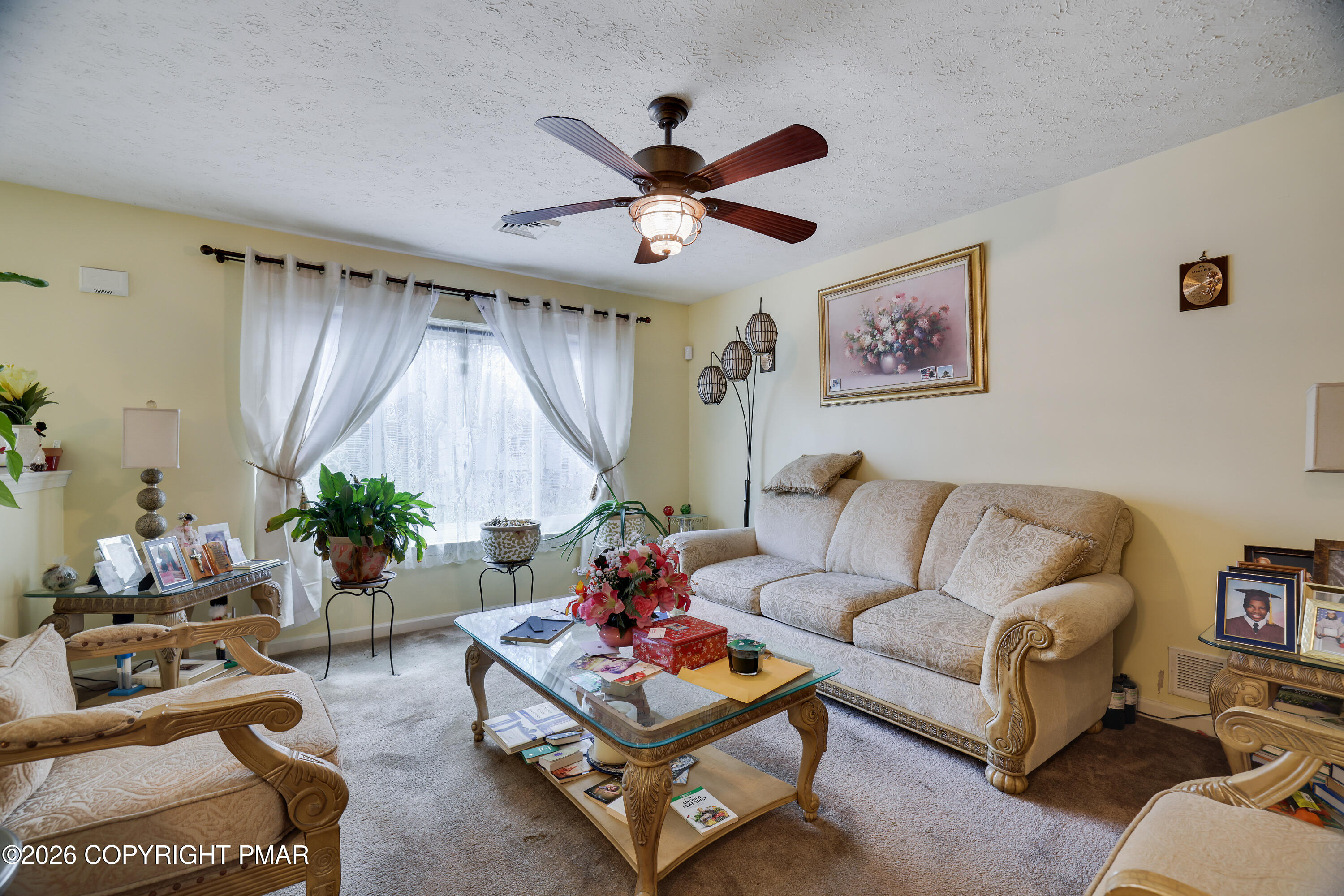 2137 Freedom Way Pocono Summit, PA 18346 - Photo 6 of 71 a living room with furniture and a large window