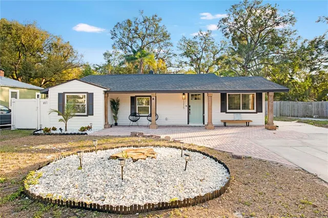 front view of a house with a swimming pool