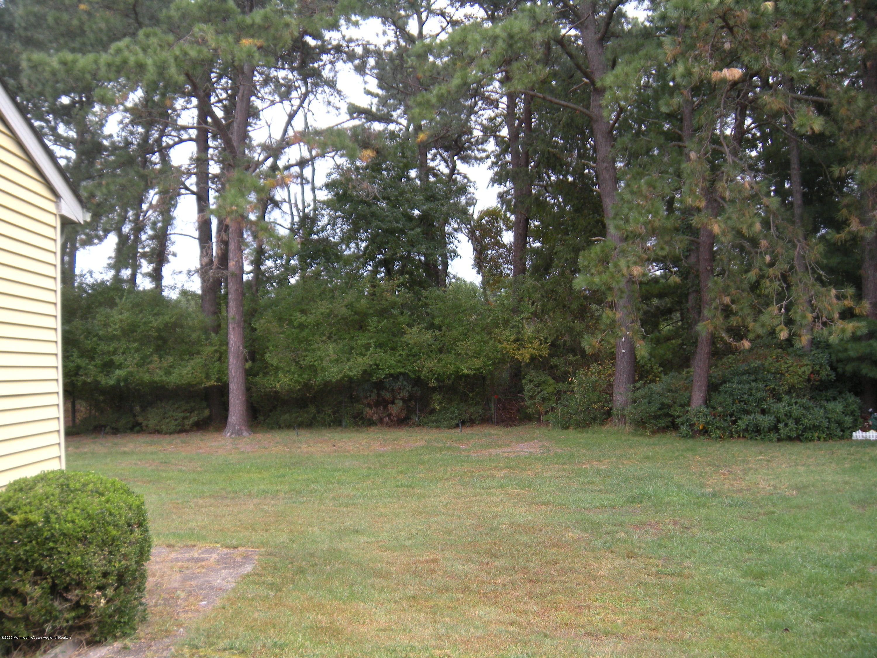 143B Sunset Road, Unit B Whiting, NJ 08759 - Photo 8 of 9 a view of outdoor space and yard