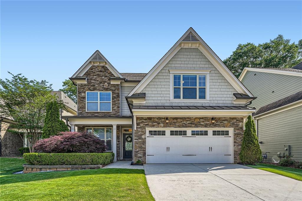 3699 School Street Chamblee, GA 30341 - Photo 1 of 1 a front view of a house with a garden
