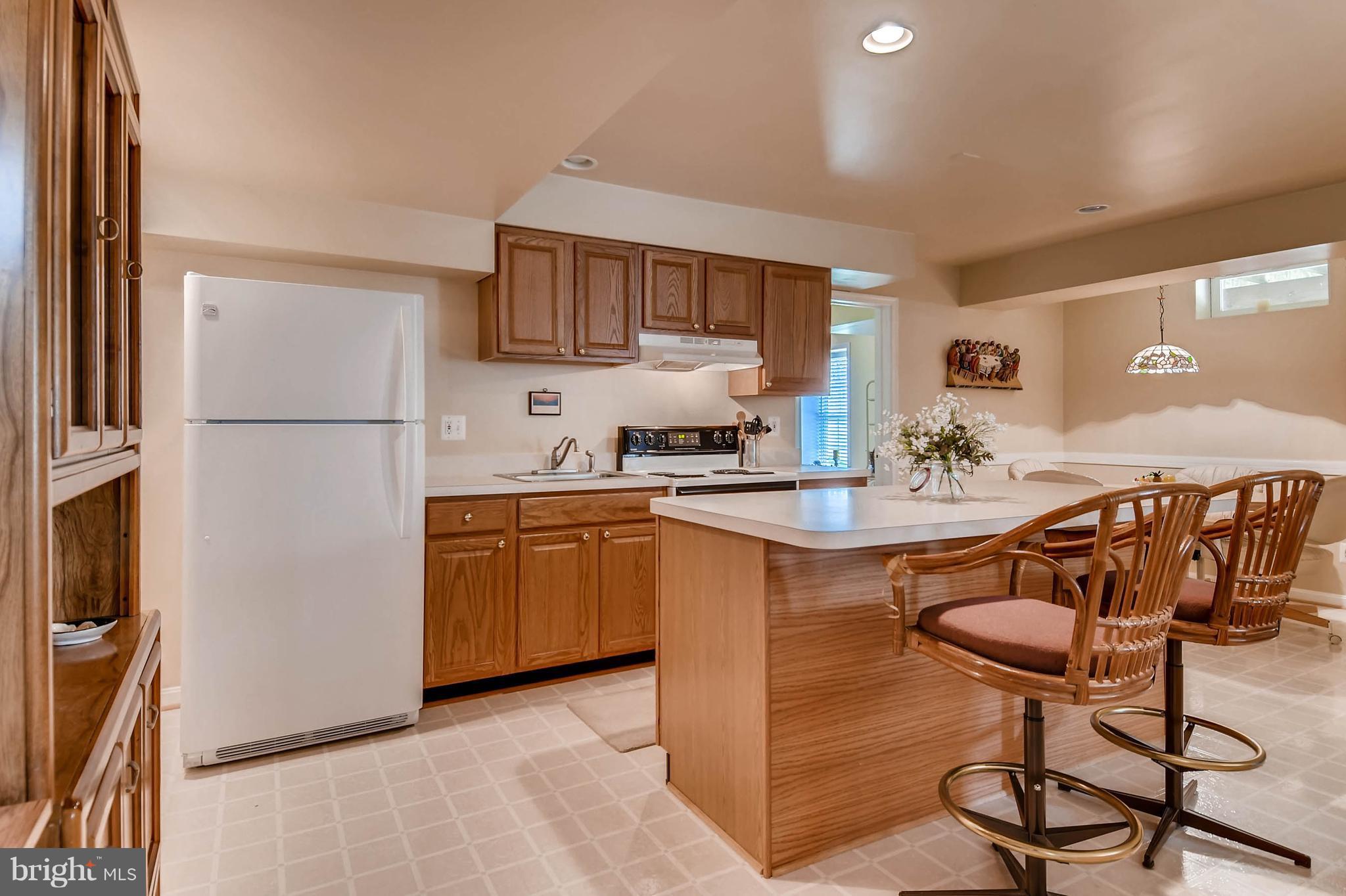 9639 Gerst Road Perry Hall, MD 21128 - Photo 24 of 30 Full 2nd kitchen w/island & table space-