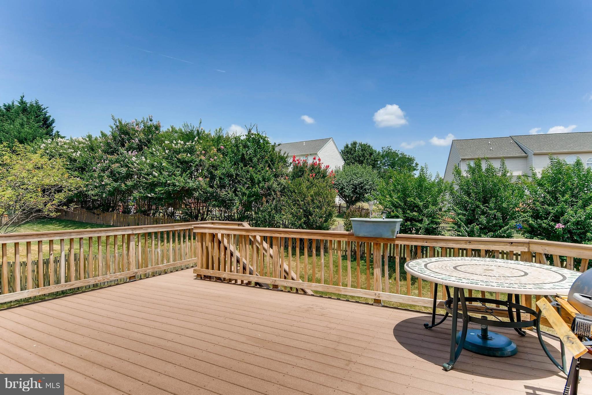 9639 Gerst Road Perry Hall, MD 21128 - Photo 29 of 30 Kitchen opens to rear deck/patio/fenced yard =